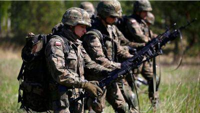Польша начала переброску военных и техники к границе с Белоруссией