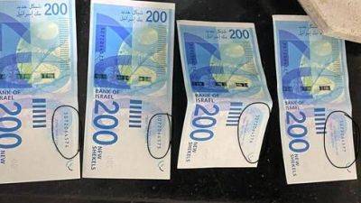В Израиле появились фальшивые шекели, которые не могут распознать даже банкоматы