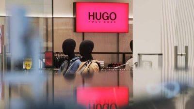 СМИ узнали о планах компании Hugo Boss продать магазины в России