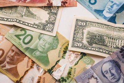 Канадский доллар достиг 2,5-месячного минимума на ожиданиях решений ФРС США