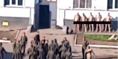 Российский комбриг раздел догола собственных танкистов и заставил их щипать траву — видео