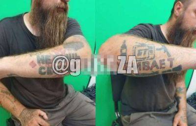 ГУБОПиК заставил мужчину свести татуировку со строчкой «Не быць скотам»