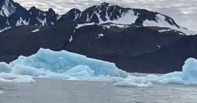 Брейк-данс в океане. Невероятный момент, как айсберг откалывается и кувыркается в воде (видео)