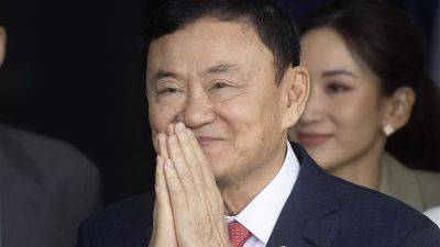 Таксин Чинават вернулся после 15-летнего изгнания и был арестован