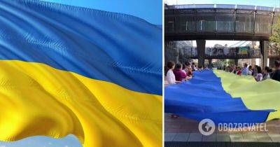День флага Украины – в Брюсселе развернули 30-метровый сине-желтый флаг, спели Ой у лузі червона калина – видео