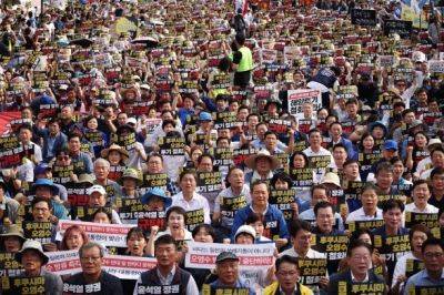 50 тысяч жителей Южной Кореи протестуют против сброса радиоактивной воды из Фукусимы