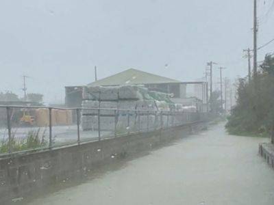 Тайфун "Канун" в Японии унес жизни двух человек, 64 получили ранения