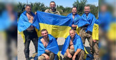 Еще 22 защитника Украины вернулись домой из плена (фото, видео)