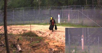 Продырявили забор: пограничники Латвии поймали белорусов на помощи нелегалам (фото)