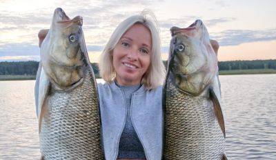 Рыбалка в Киевской области - женщина поймала больших жерехов - фото