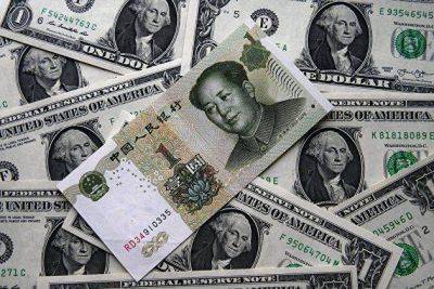 Доллар и юань завершили торги на 96,87 рубля и 13,3 рубля соответственно