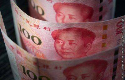 Курс юаня к доллару США упал до минимума за 16 лет