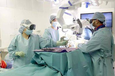 Хирурги провели первую в Великобритании операцию с помощью гарнитуры Apple Vision Pro - gagadget.com - Англия - Лондон