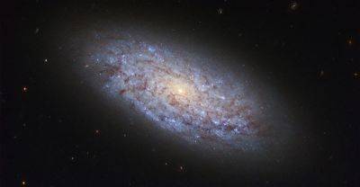 Ученые исследовали тройную карликовую галактику в созвездии Девы
